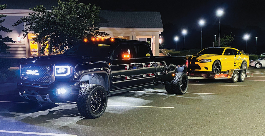 truck towing another car