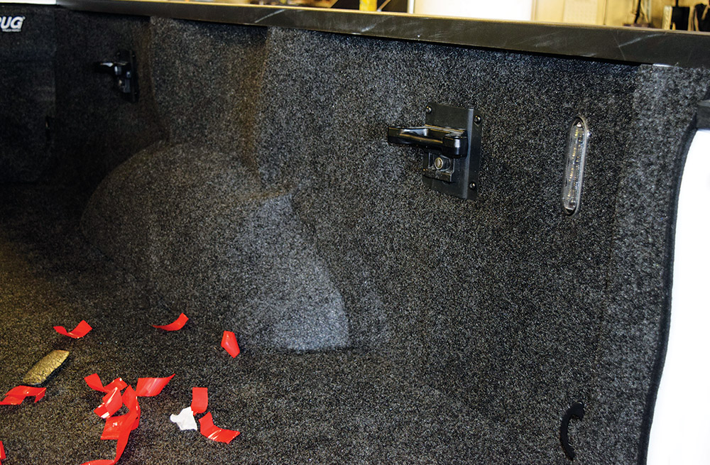Securing bedliner side walls