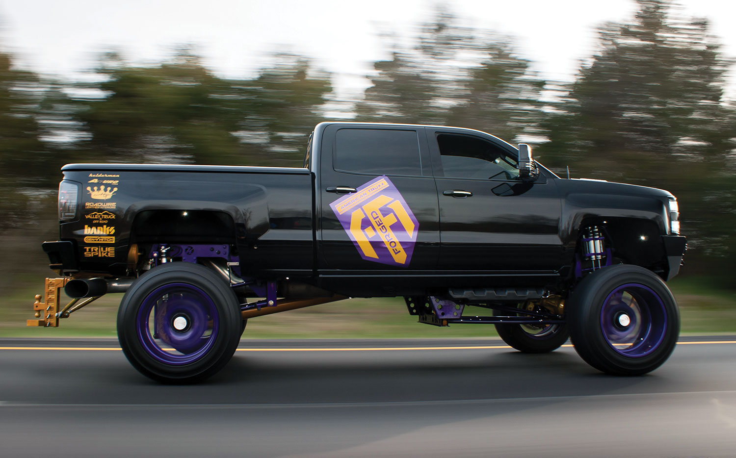 Nick Ledwell's SEMA L5P driving fast down road