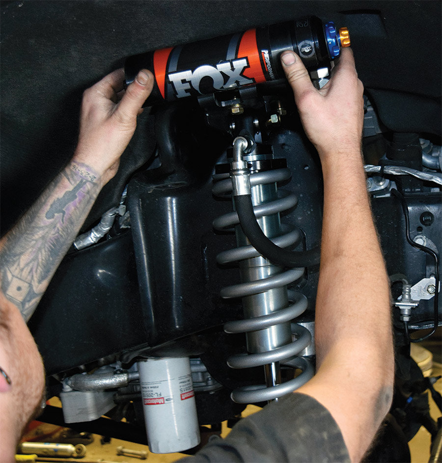 the new coilovers being installed