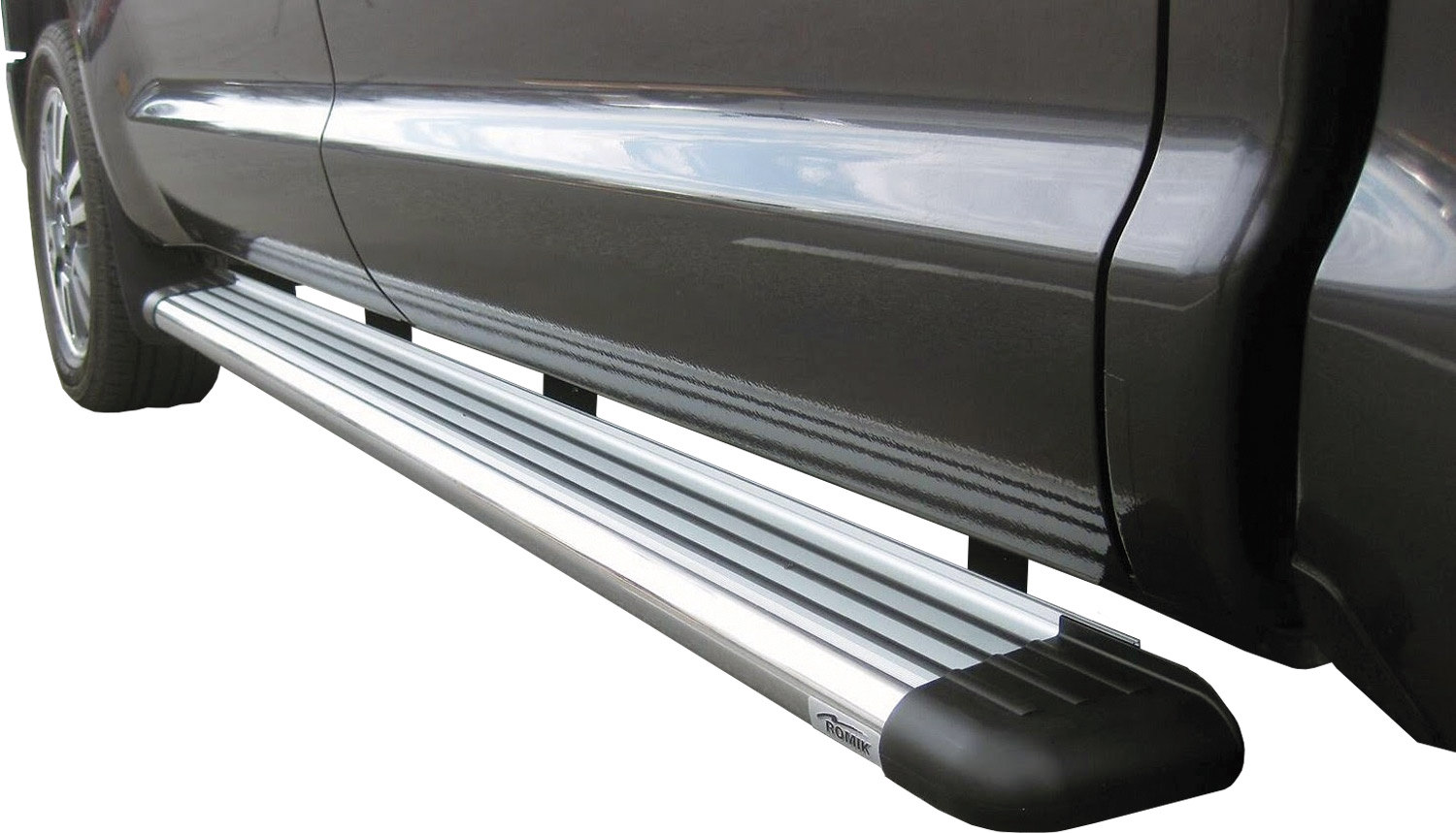 a Romik running board installed on a vehicle
