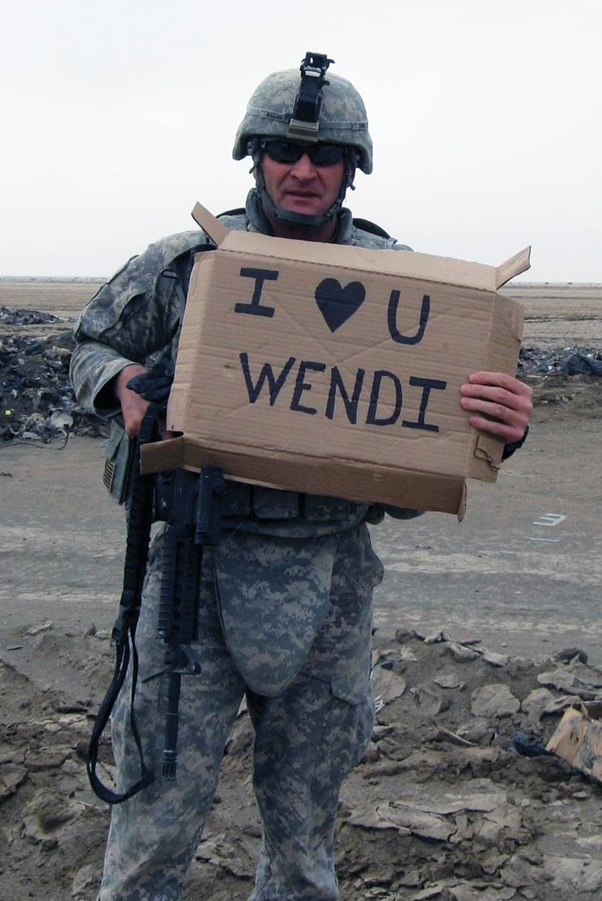 troop with sign that says I love you wendi