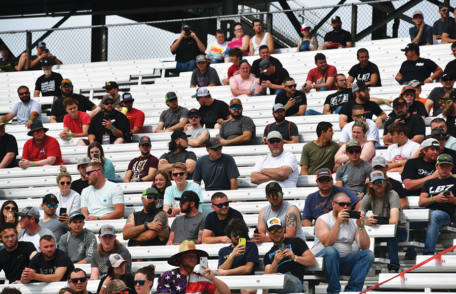 crowd in the stands at the race