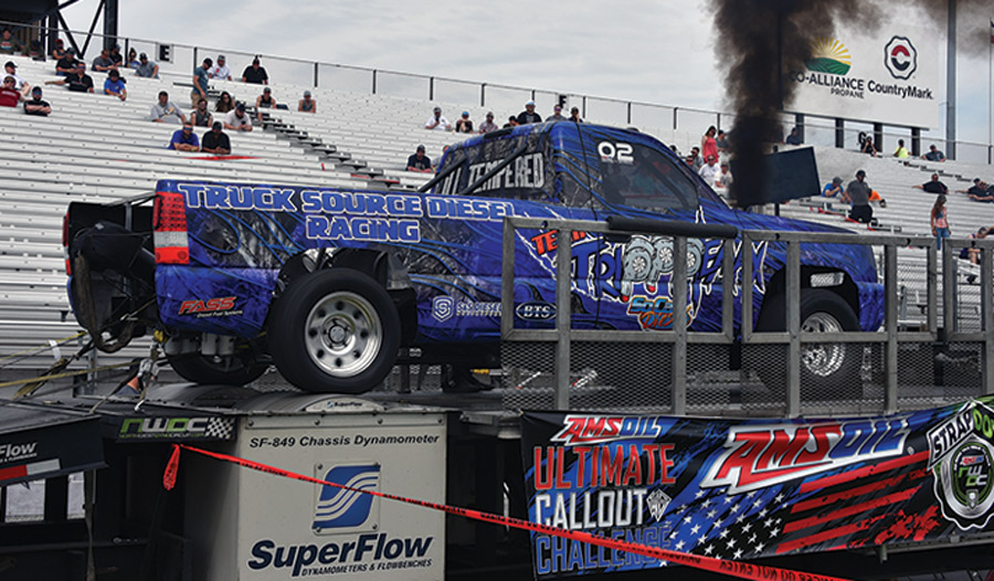 blue truck on podium