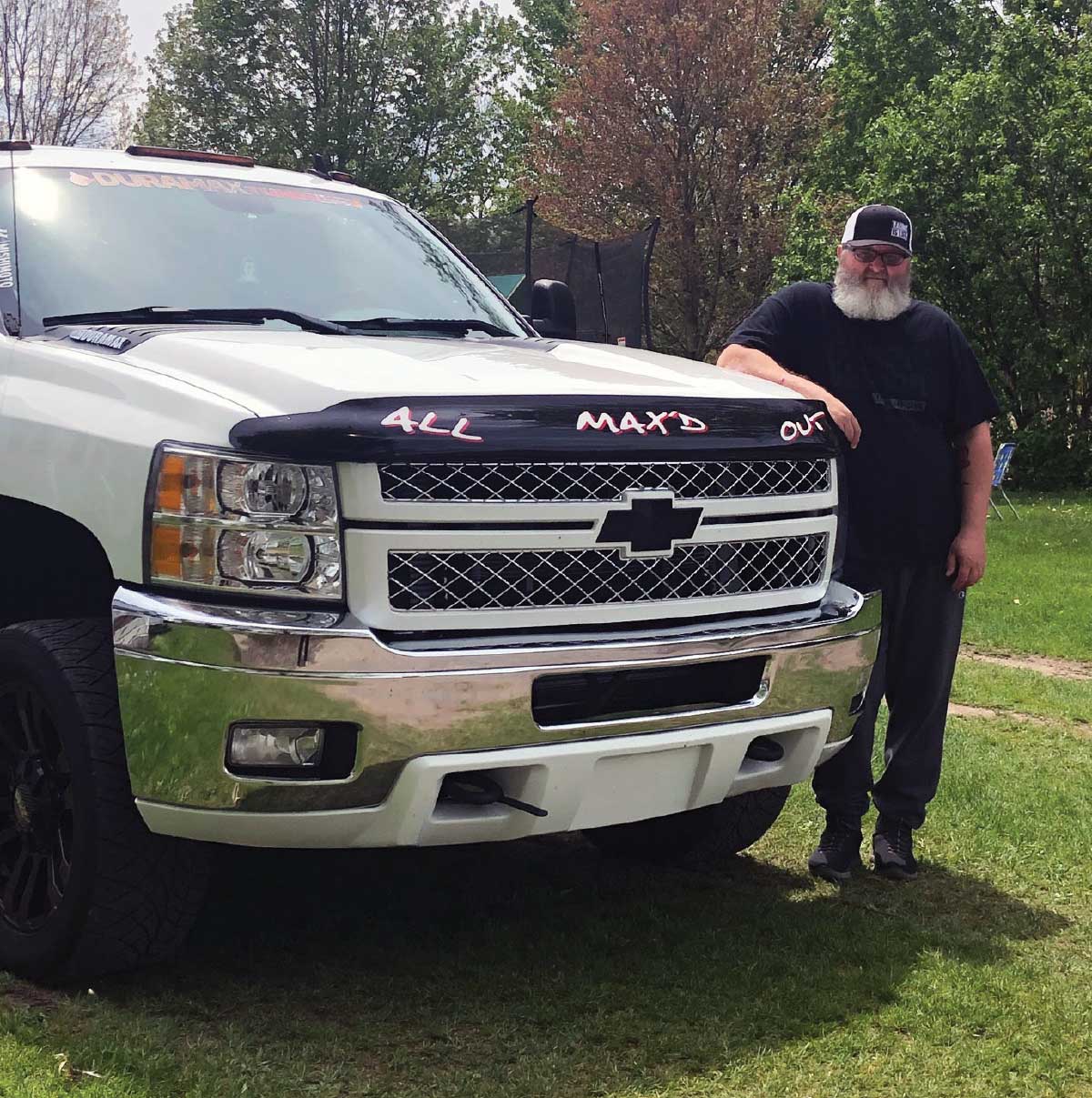 Man next to his truck