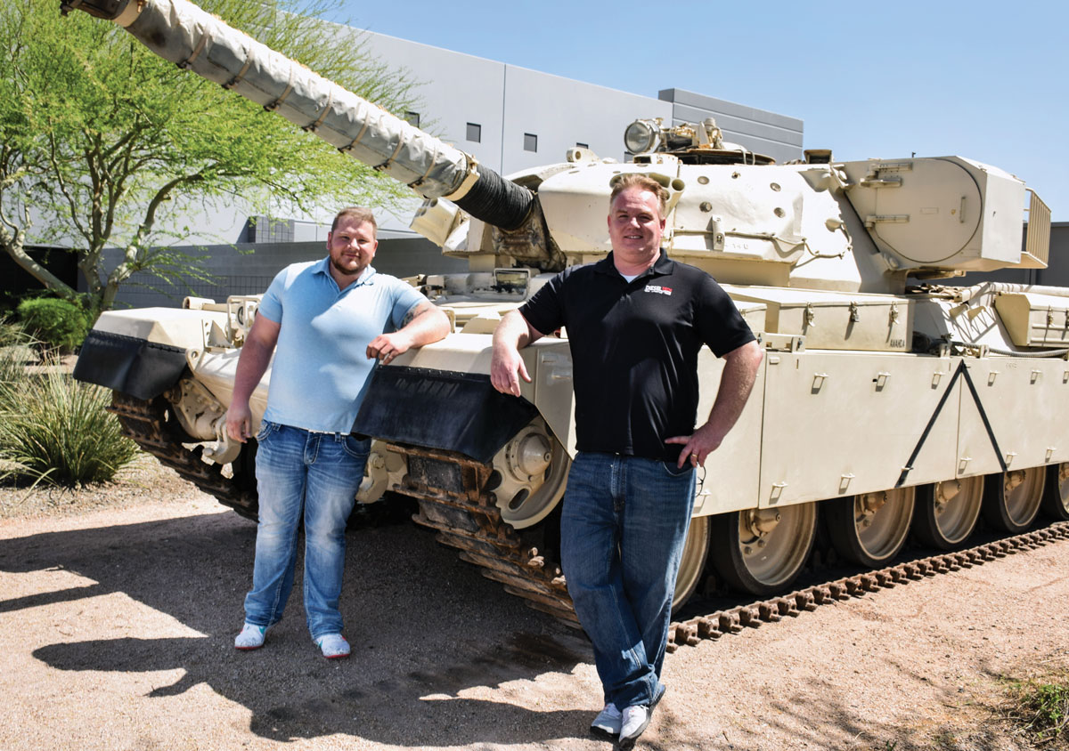 Bullet Proof Diesel workers in front of Bullet Proof Diesel workers in front of tank tank