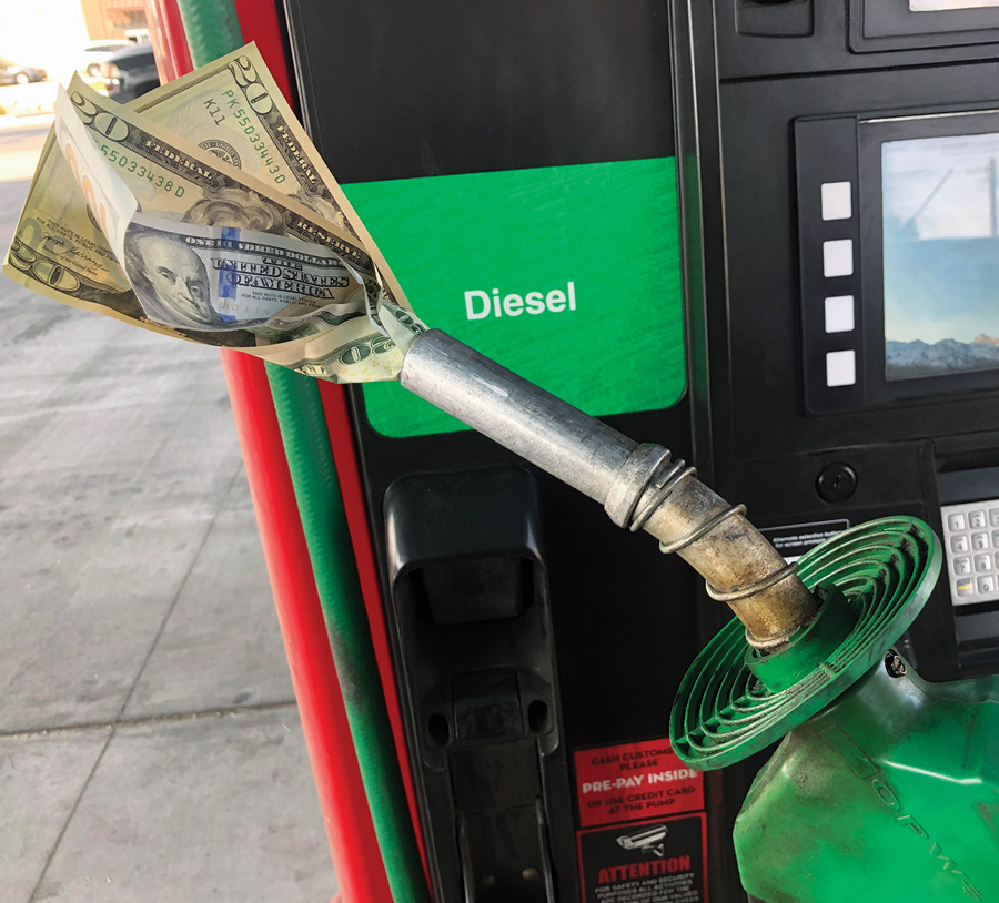 Gasoline tank with money coming out the nozzle