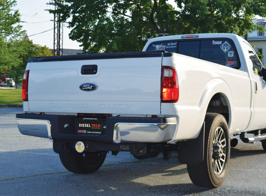rear end of white Ford truck