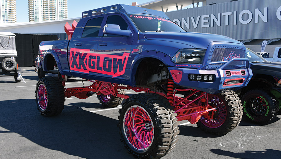 lifted pink and blue truck