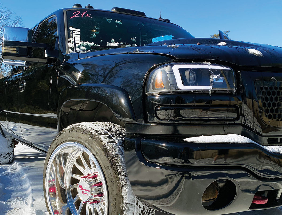 2003 GMC Sierra 2500 headlight closeup