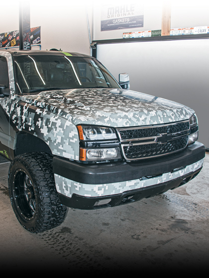 pixelated gray camo truck