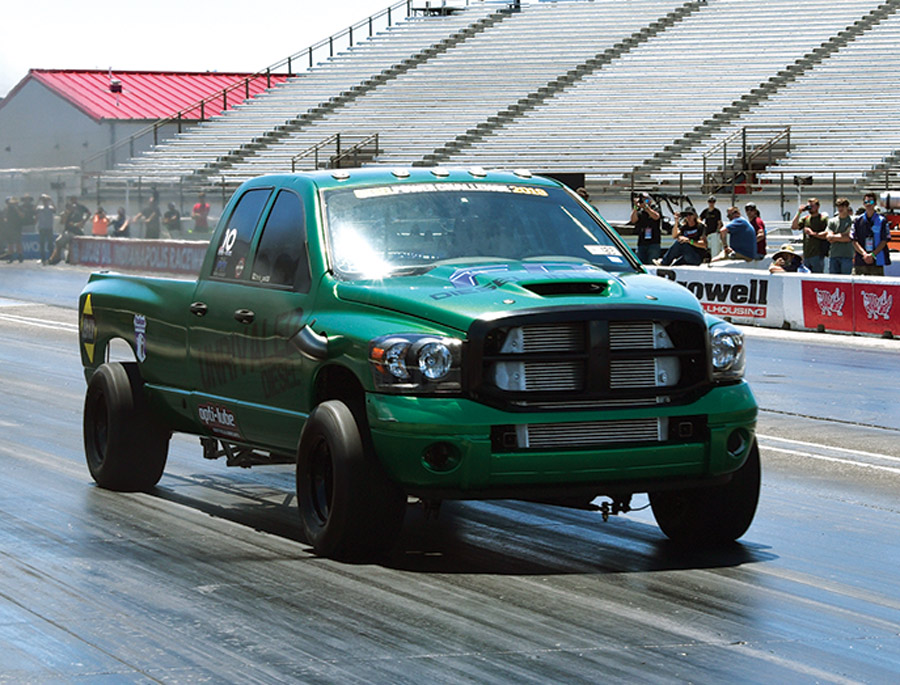 green truck in drag race