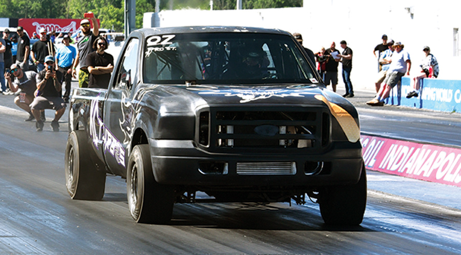black truck in drag race