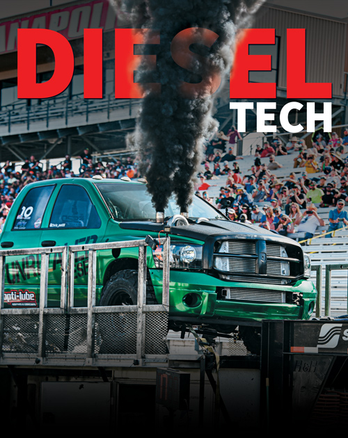 green truck on stage blowing smoke with Diesel Tech title intertwined
