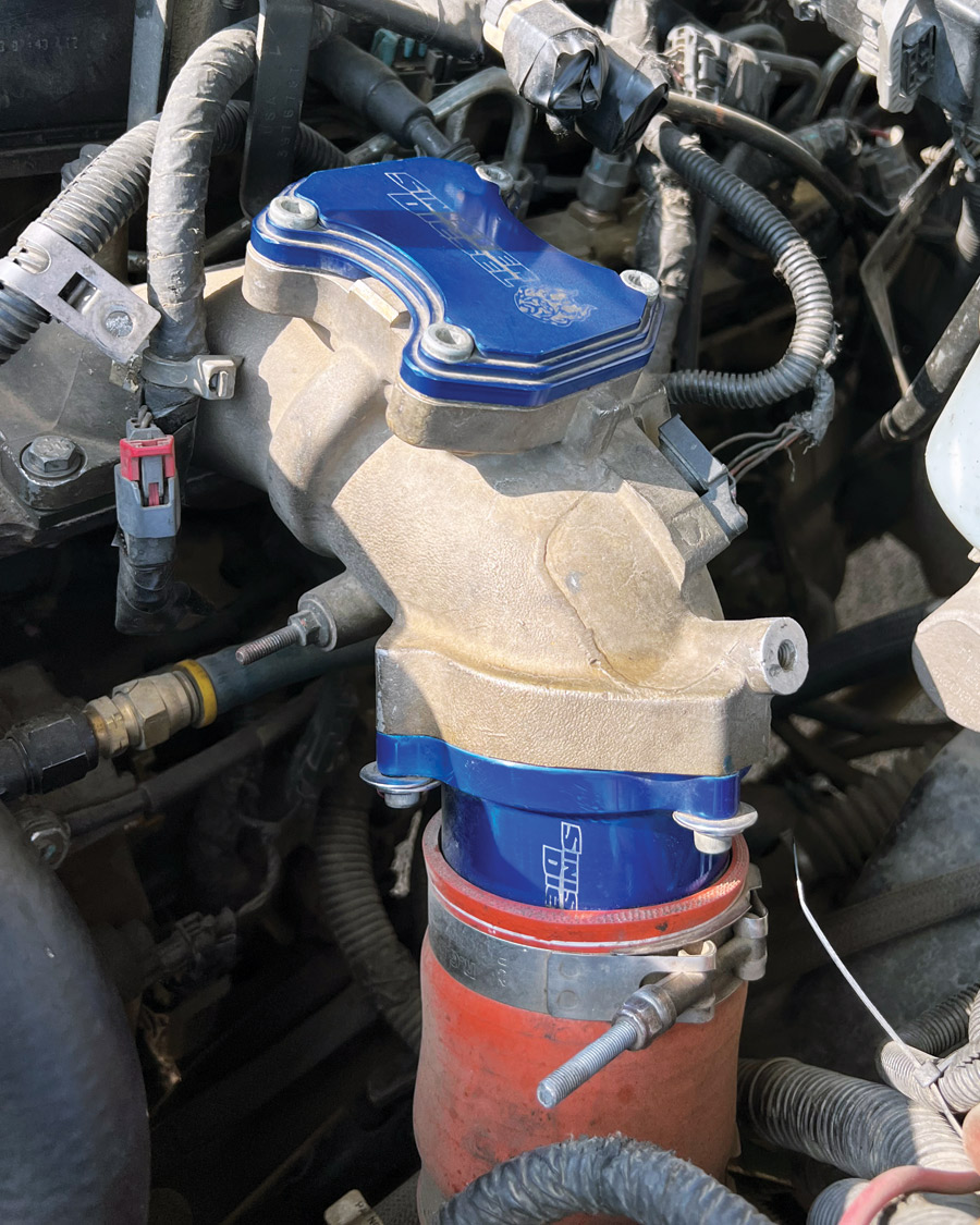 blue, white, and orange truck valve