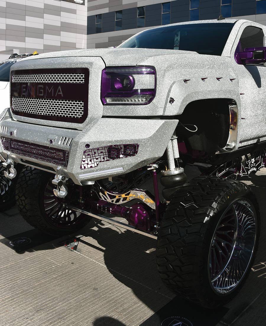 white truck with purple trim