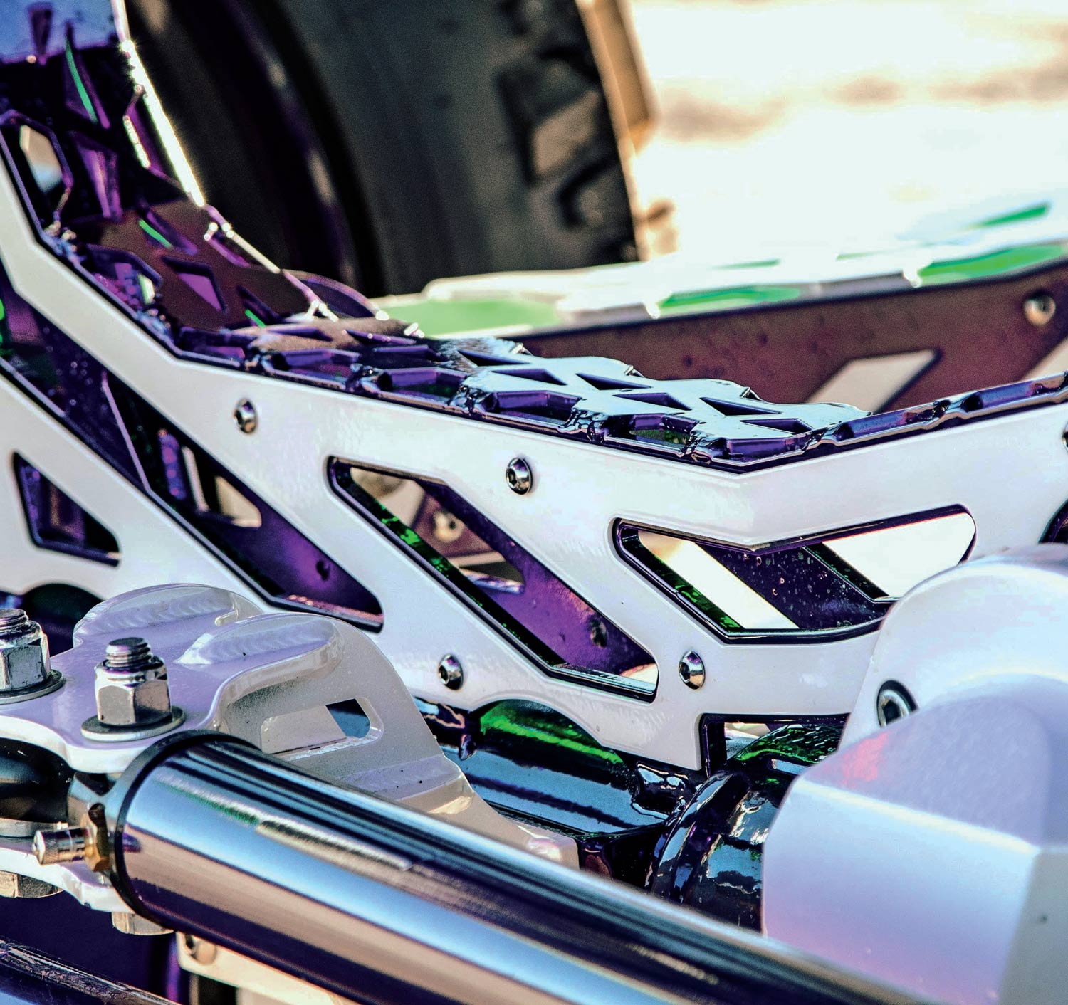 purple and white detailing near the back of the truck tire