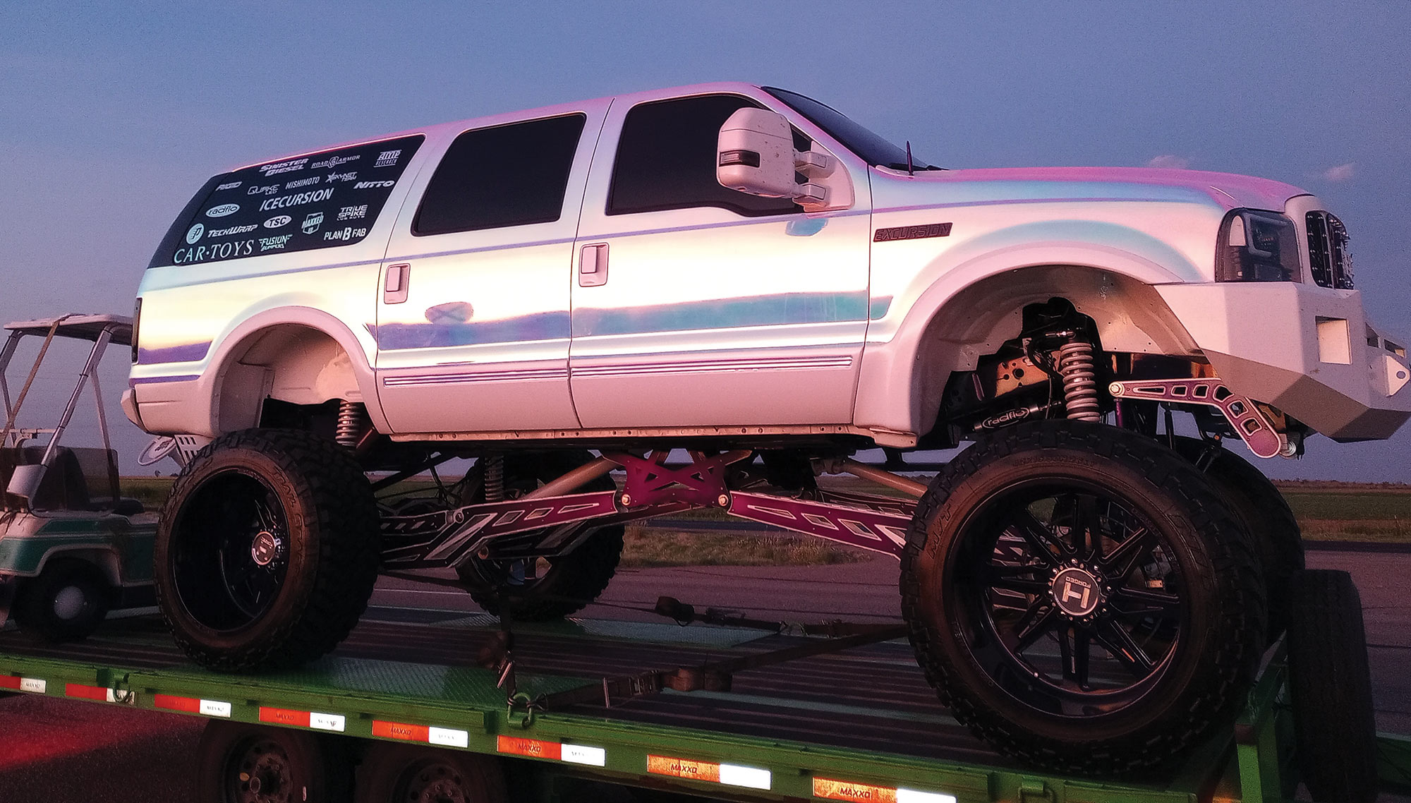 side profile of truck on trailer