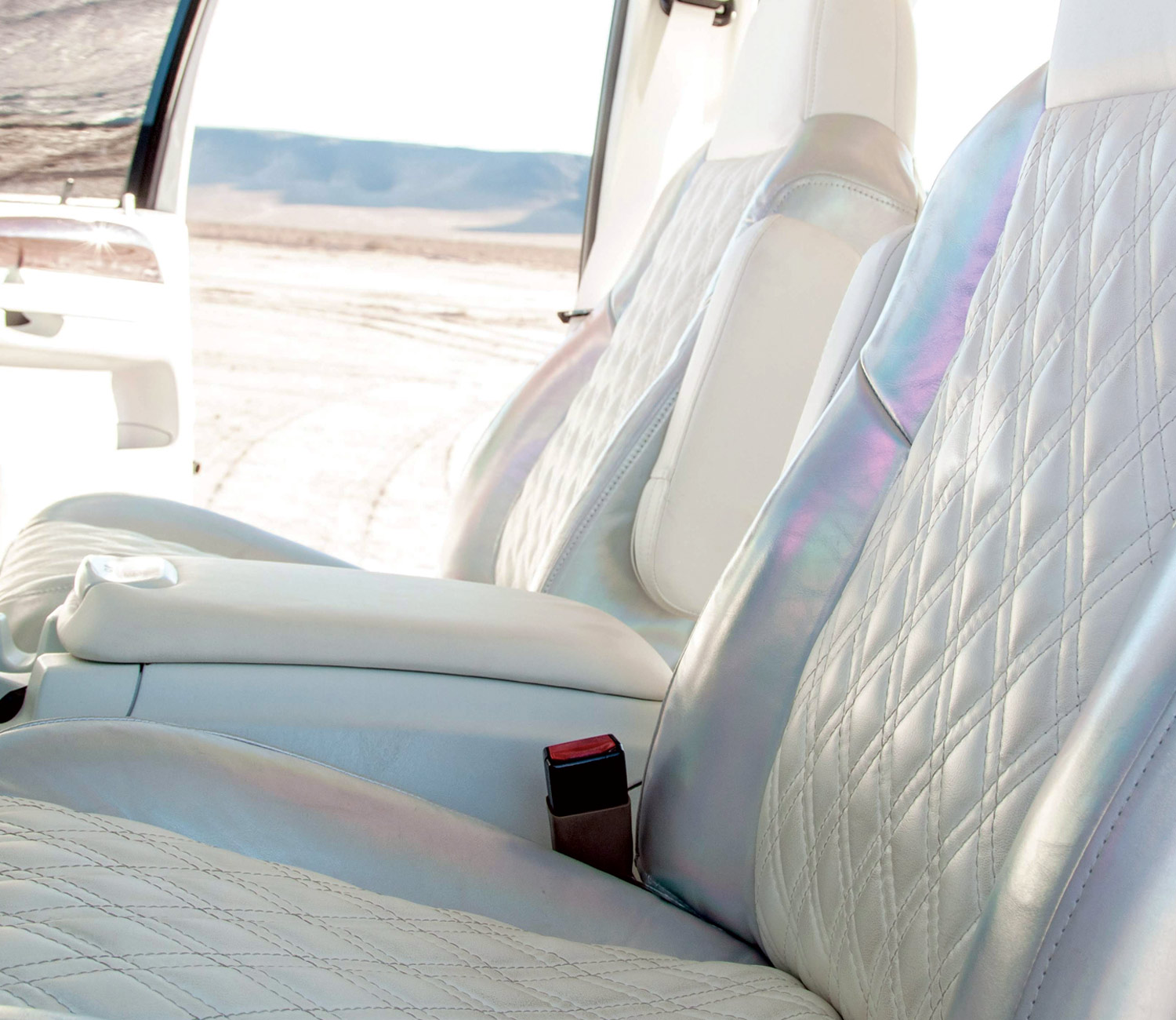 white leather seats with holographic shine